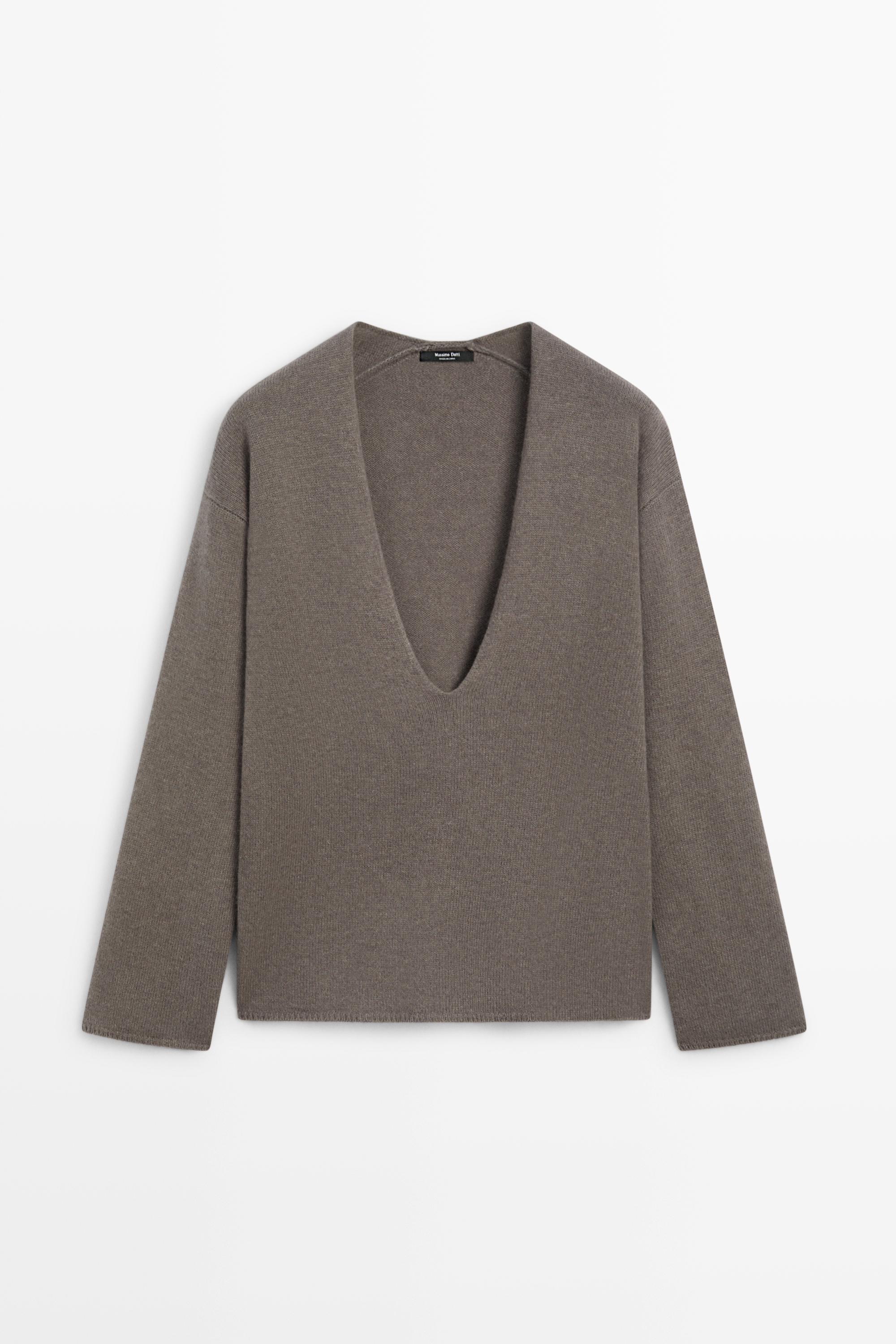 Long-line knit sweater with neckline detail